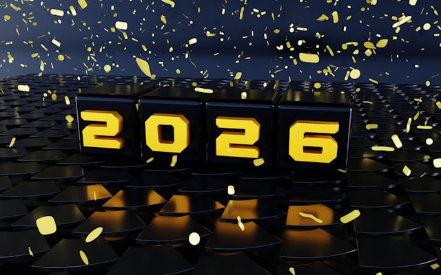 2026 on black blocks with gold confetti, celebrating new year 2026.