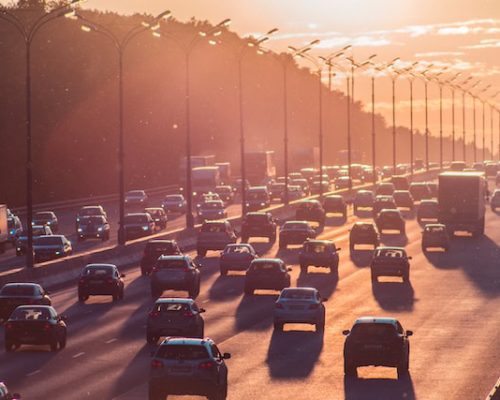 Cars on the road with a lot of traffic